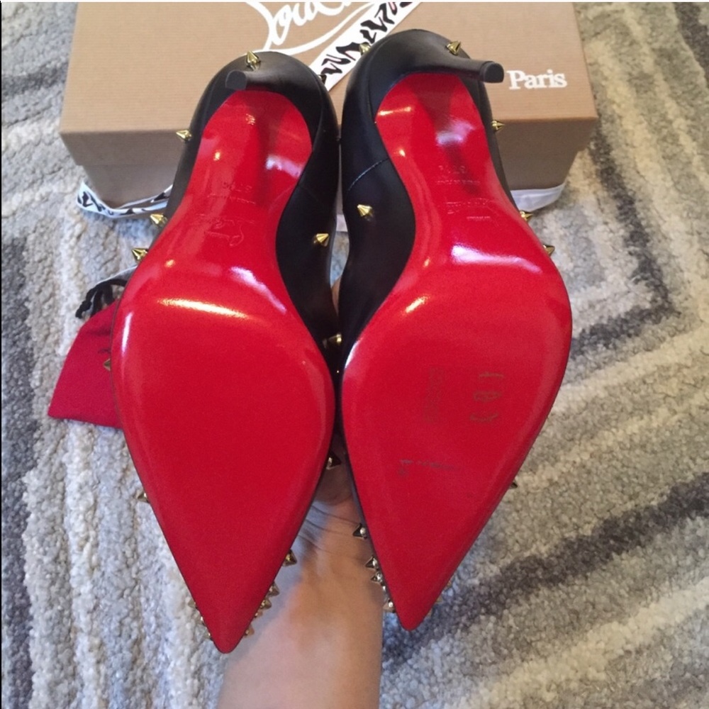 Christian Louboutin gegraspike heels